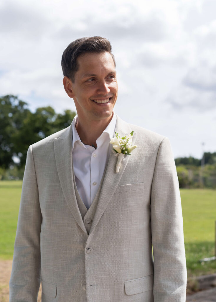 a groom on his wedding day buy the Isle of Wight photographer