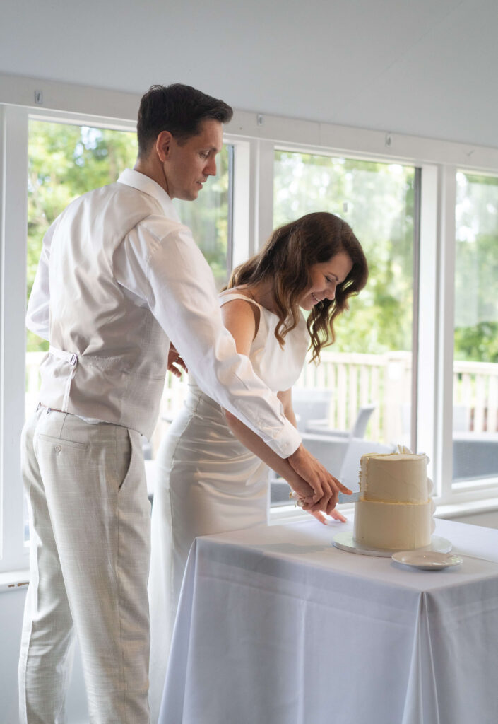 A cake cutting the Isle of Wight wedding